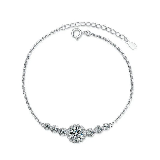 RingShing luxury moissanite halo bracelet in white gold featuring bezel-set side stones on a delicate chain.