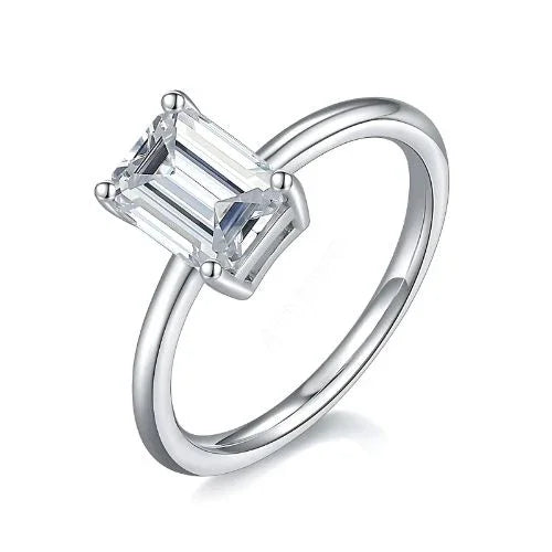 RingShing emerald cut moissanite solitaire engagement ring in a 4-prong setting on a polished silver band.