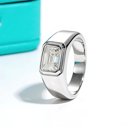 RingShing luxury men's emerald cut moissanite ring in a thick polished white gold bezel setting.