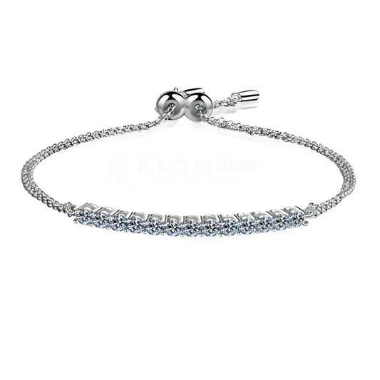 RingShing adjustable silver bolo bracelet featuring a brilliant row of round moissanite stones.