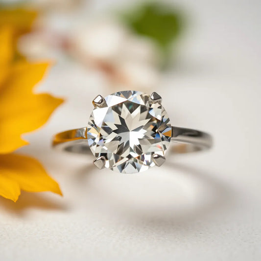 A crisp moissanite stone with bright facets and subtle rainbow flashes in soft light